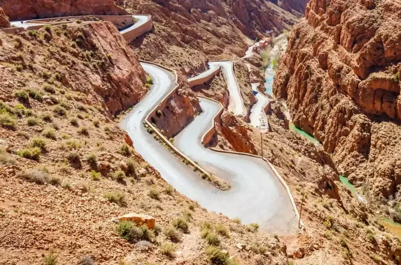 Sahara Desert Tour from Marrakech winding mountain road through Dades Valley canyon Morocco